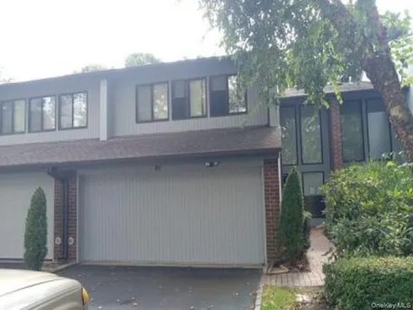 a house view with a outdoor space