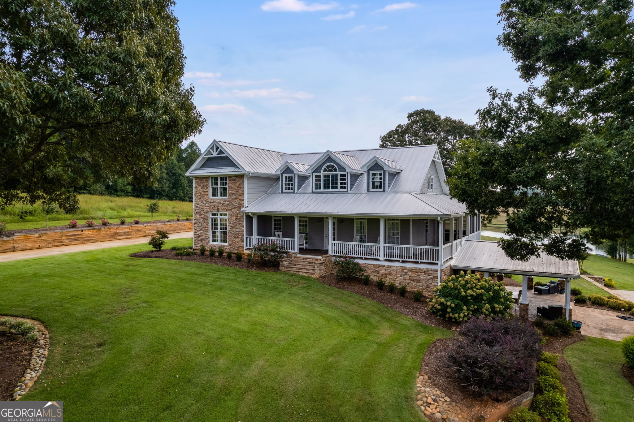 278 Dickerson Road Franklin, GA 30217 - Photo 1 of 1 a front view of a house with a garden and trees