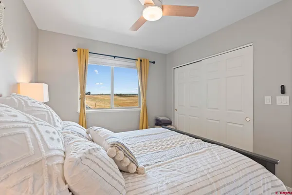 a kitchen with a table and chairs