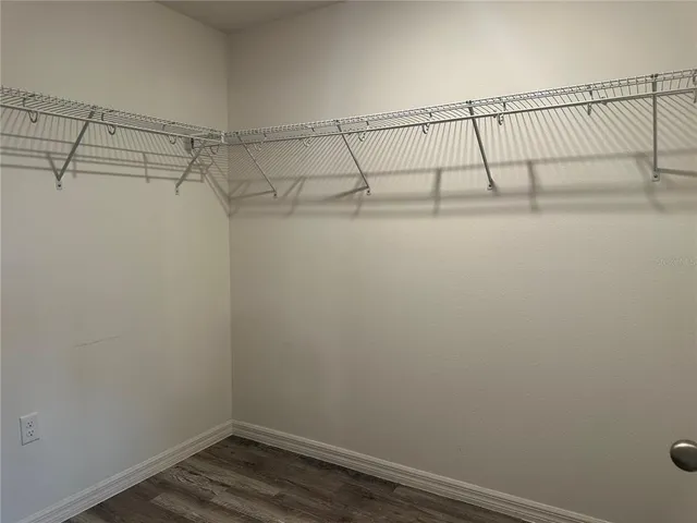 a view of a room with racks on the wall