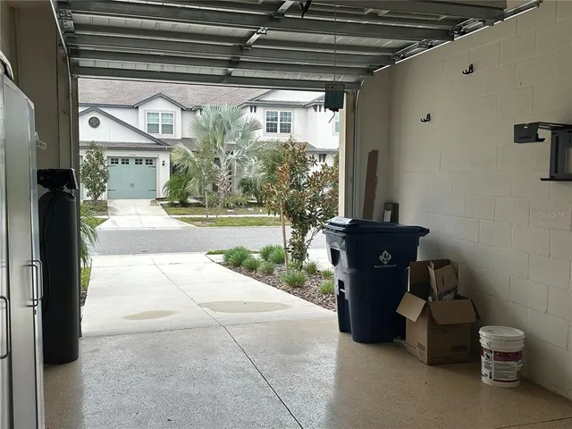 a view of a porch with furniture and a porch