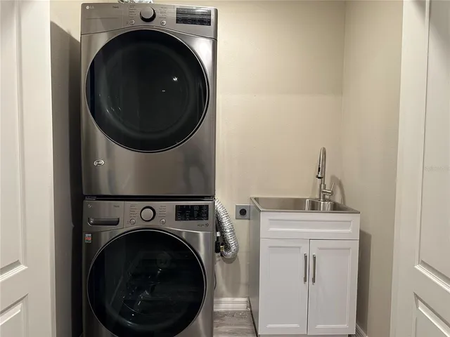a utility room with dryer and washer