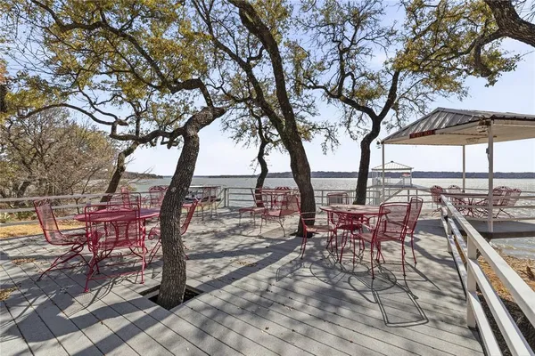 a terrace with a lake view