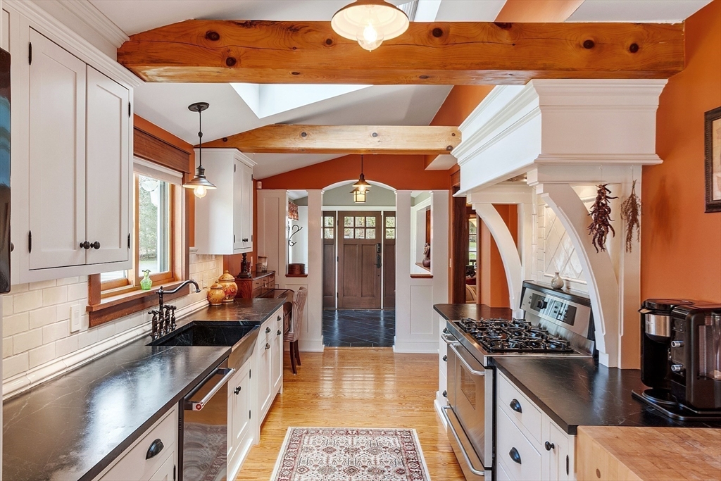 360 Teel Road Winchendon, MA 01475 - Photo 9 of 42 a kitchen with stainless steel appliances granite countertop a stove and a sink