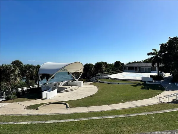 a view of a cafe with sitting area