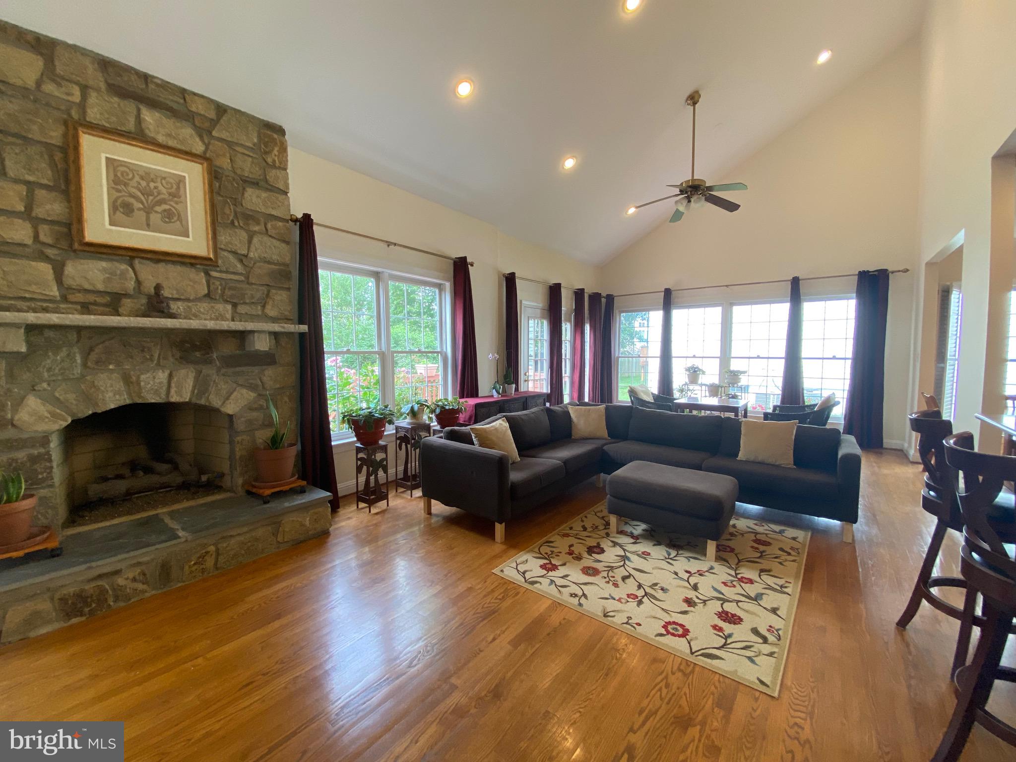 10614 Maplecrest Lane Potomac, MD 20854 - Photo 9 of 51 WIDE OPEN SPACE SURROUNDS GORGEOUS STONE FIREPLACE