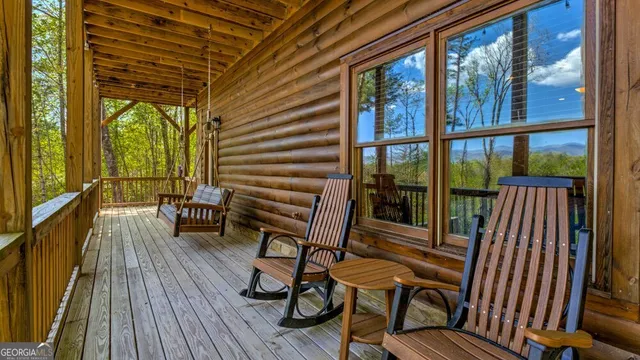 a view of chairs in wooden deck