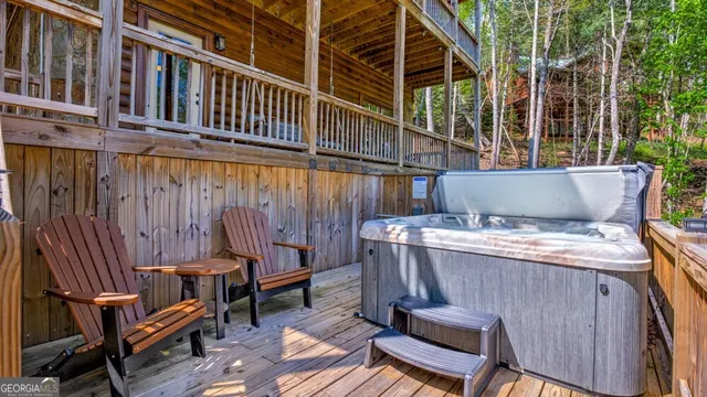 a view of a patio with a table and chairs