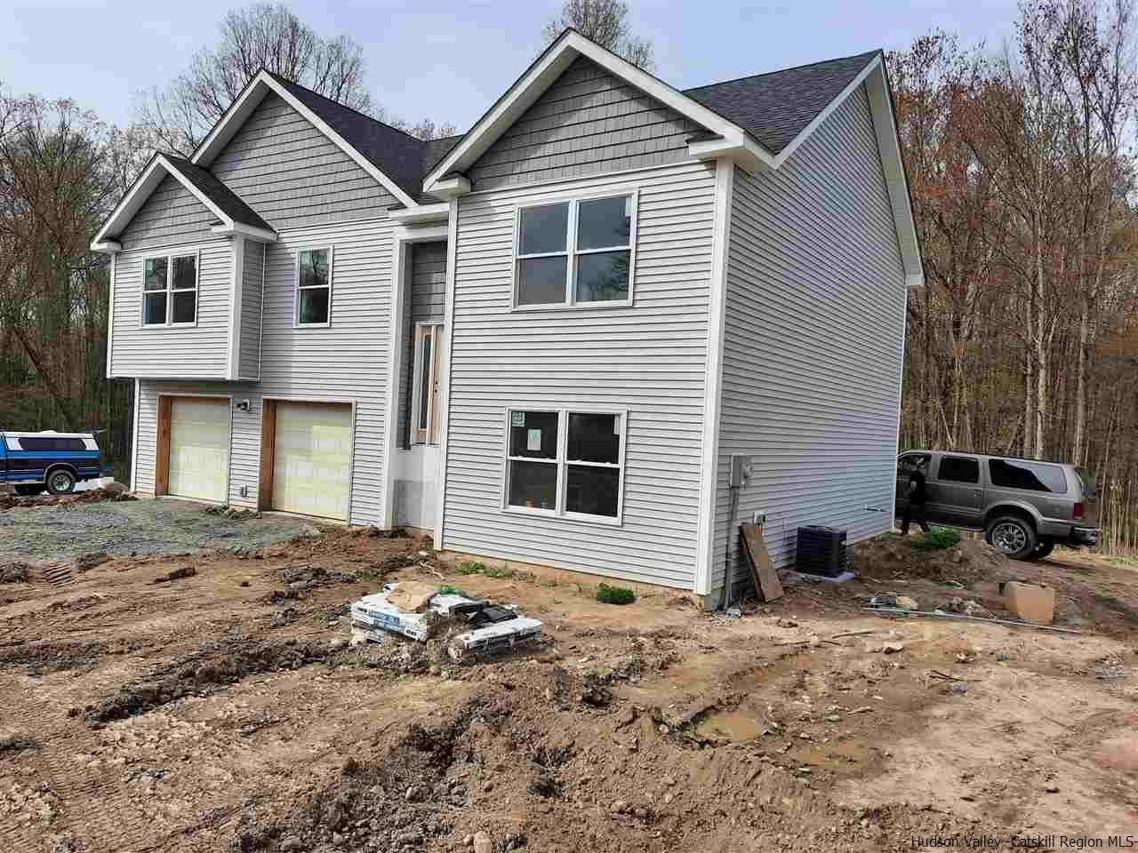 858 Wallkill Avenue Wallkill, NY 12589 - Photo 3 of 9 a view of a house with backyard