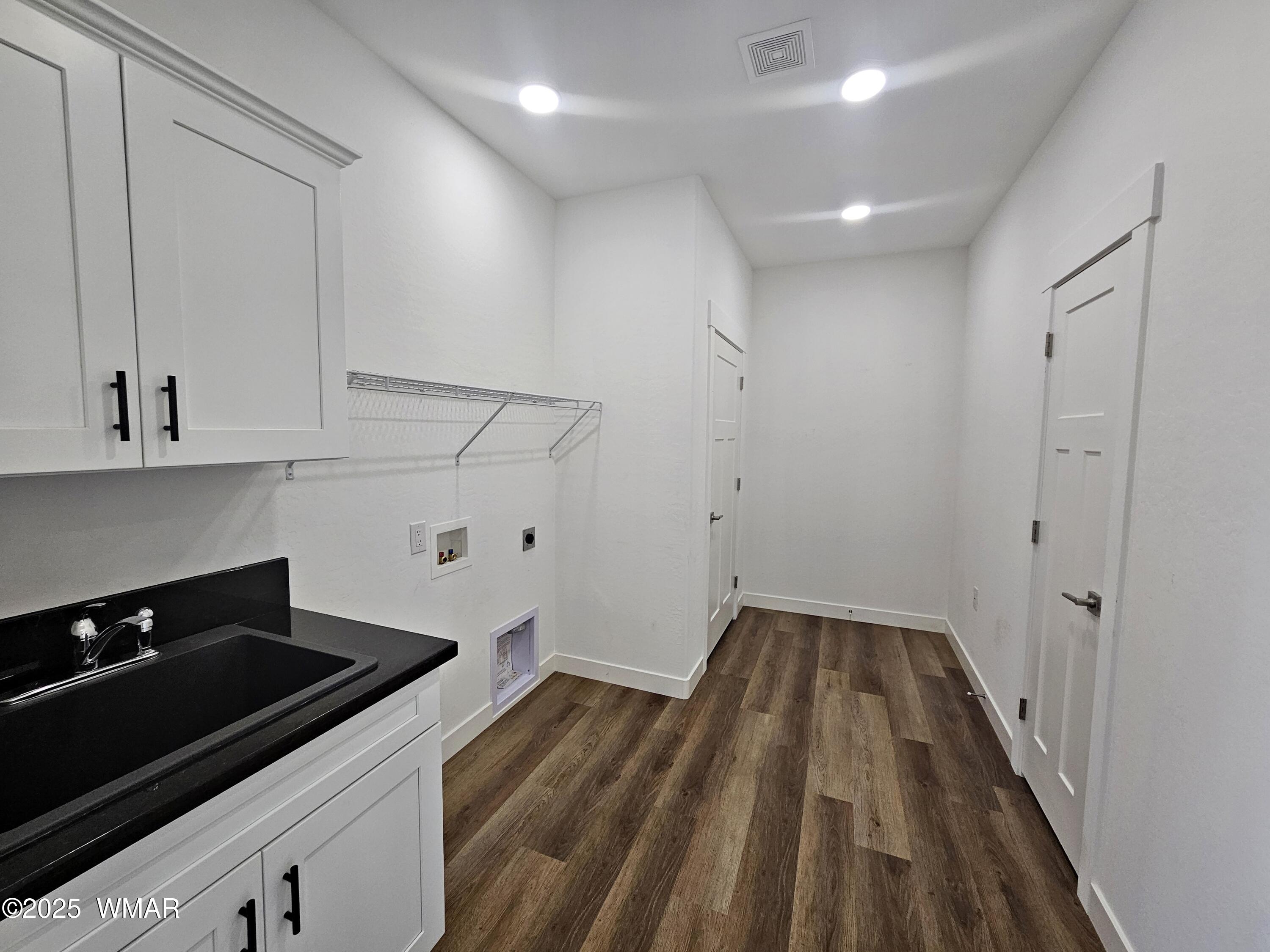 759 South 5th W Street Snowflake, AZ 85937 - Photo 11 of 18 a view of a kitchen from the hallway
