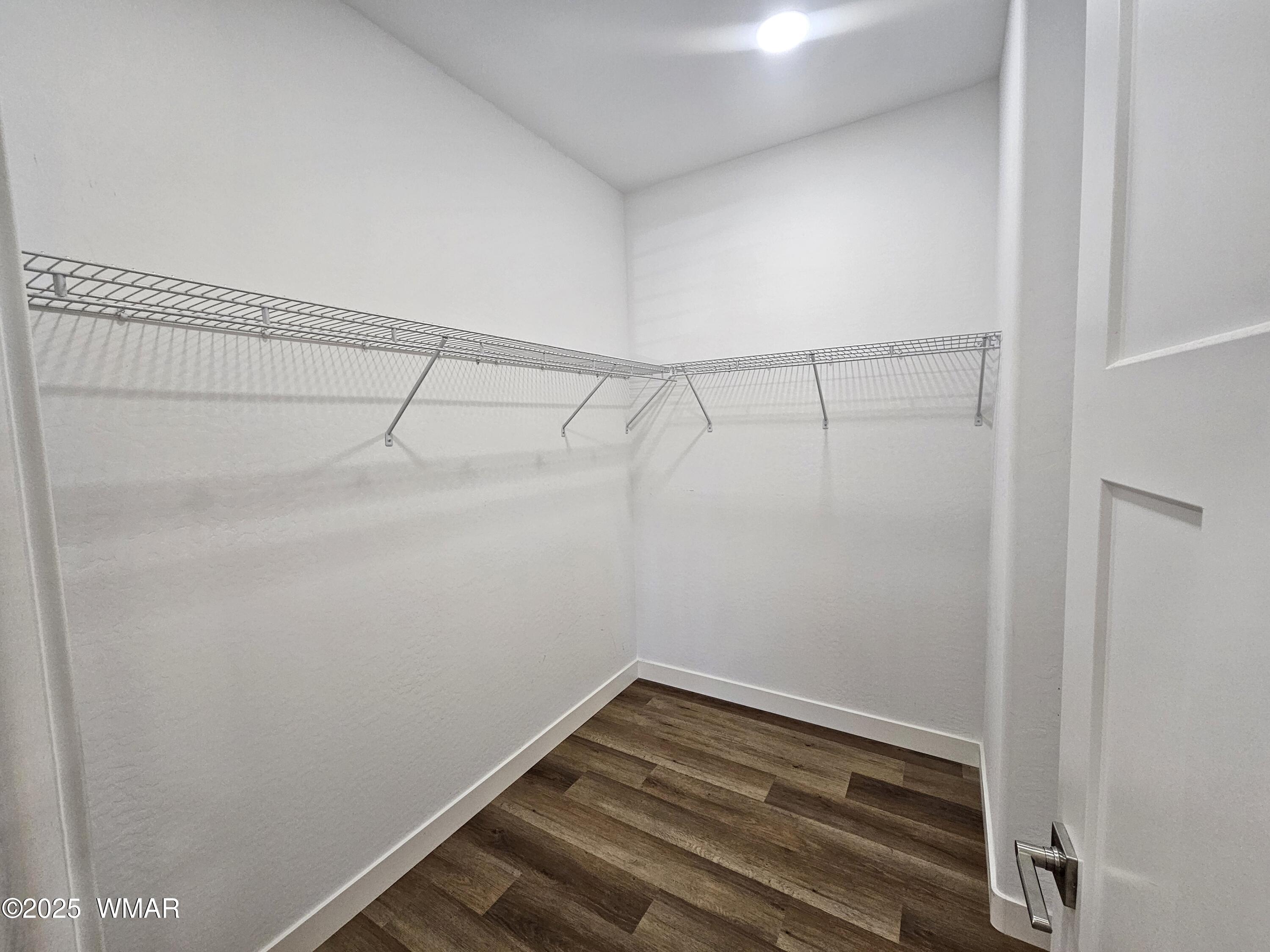 759 South 5th W Street Snowflake, AZ 85937 - Photo 14 of 18 a view of a room with racks on the wall