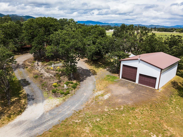 11754 Dixie Road White City, OR 97503 - Photo 21 of 38 a view of a house with a yard