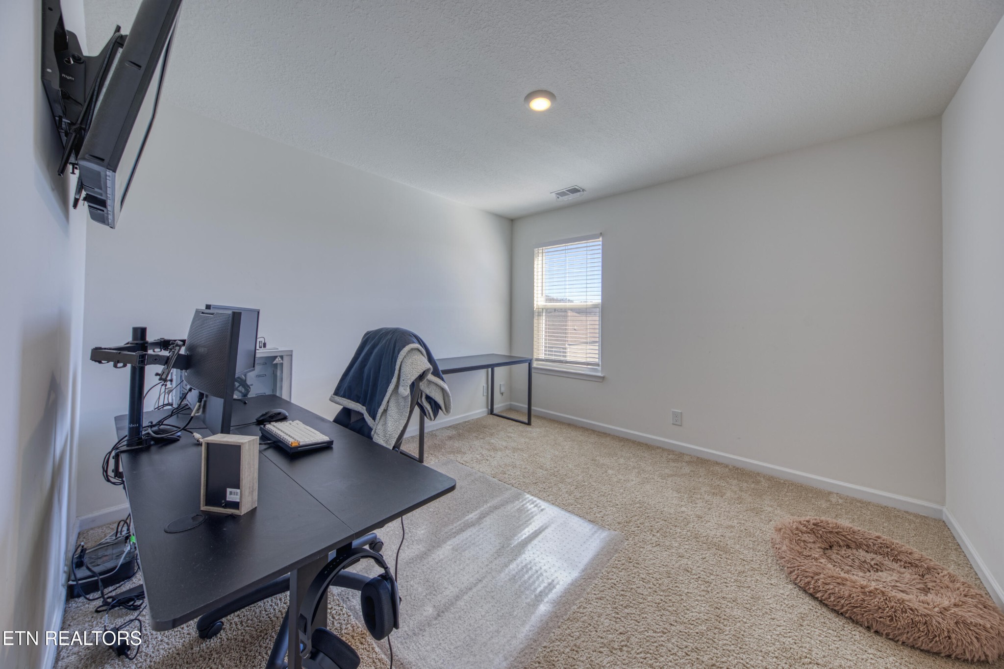 155 Ibis Loop Oak Ridge, TN 37830 - Photo 11 of 20 a view of a workspace with furniture and a window