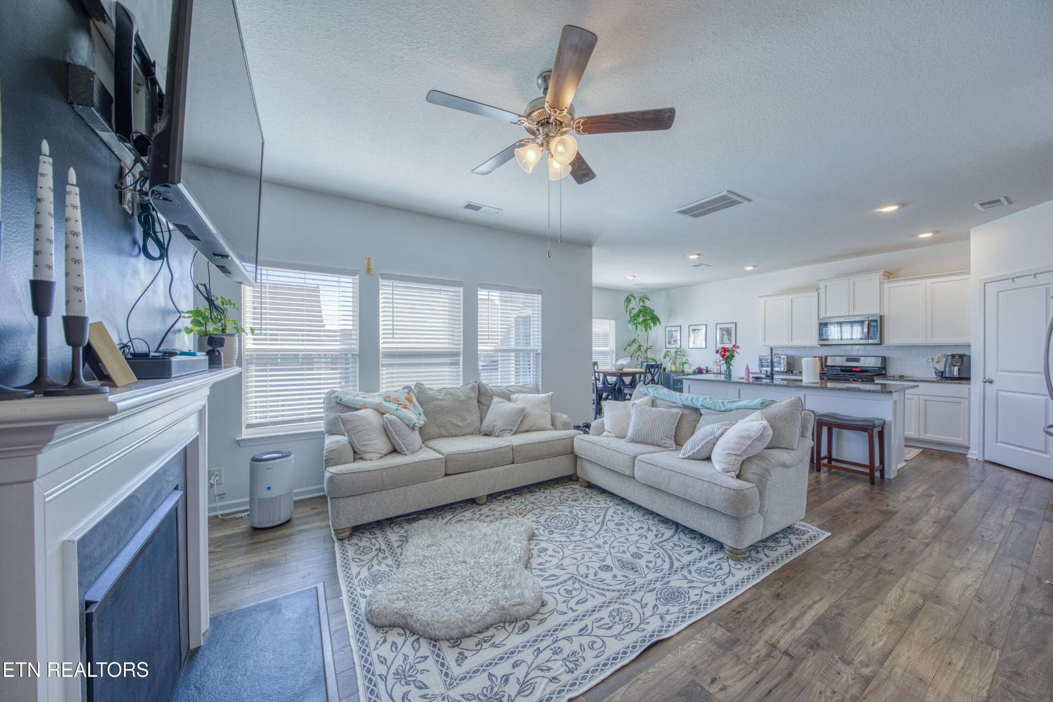 155 Ibis Loop Oak Ridge, TN 37830 - Photo 4 of 20 a living room with furniture and a fireplace