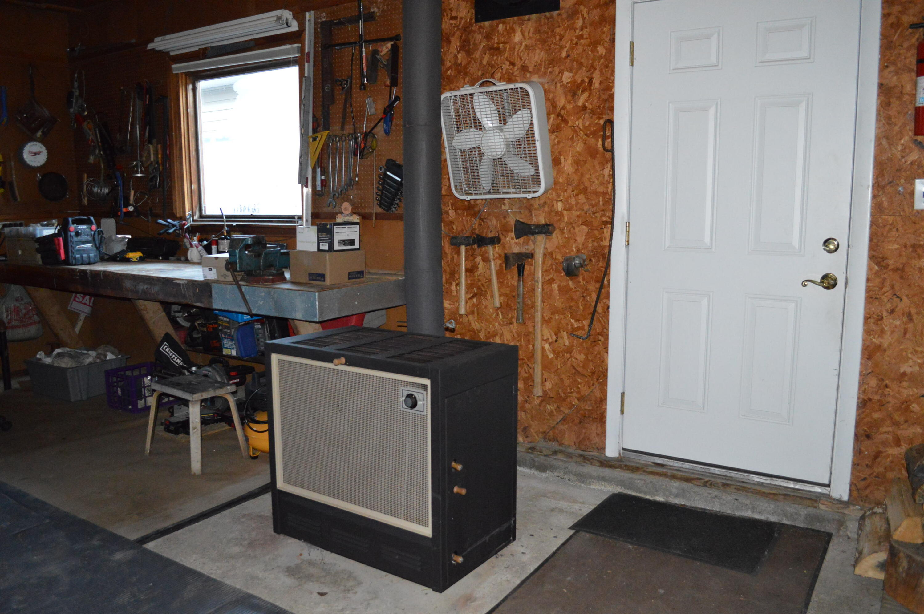 342 Aroostook Road Fort Kent, ME 04743 - Photo 17 of 68 Wood furnace in garage
