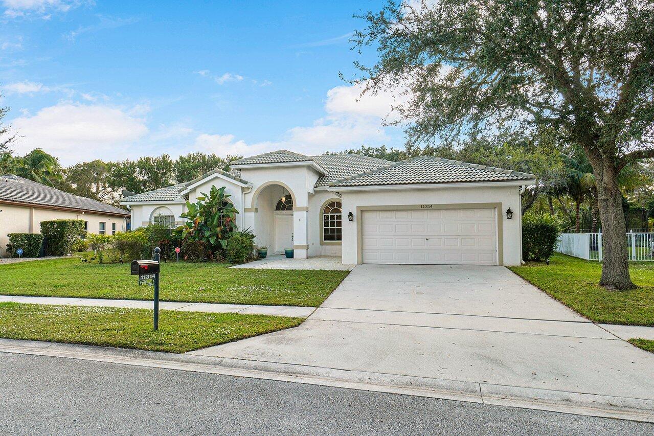 11314 Edgewater Circle Wellington, FL 33414 - Photo 29 of 31 003-11314EdgewaterCir-Wellington-FL-SMAL