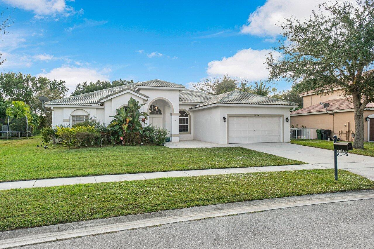 11314 Edgewater Circle Wellington, FL 33414 - Photo 30 of 31 002-11314EdgewaterCir-Wellington-FL-SMAL