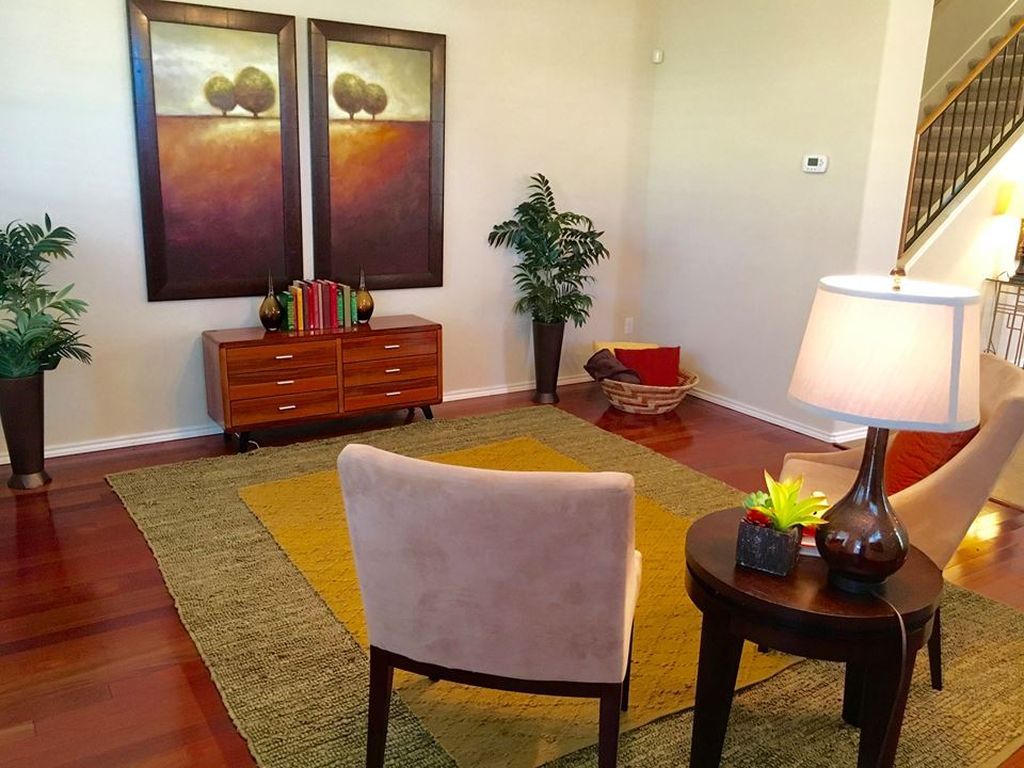 14815 Avery Ranch Boulevard, Unit 3002 Austin, TX 78717 - Photo 6 of 9 a living room with furniture and wooden floor