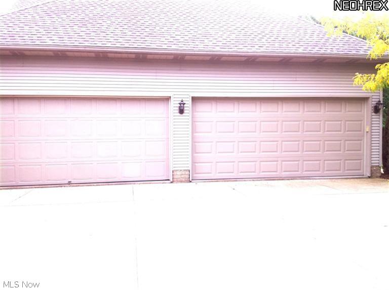3997 Raintree Circle Uniontown, OH 44685 - Photo 16 of 16 attached four car garage.
