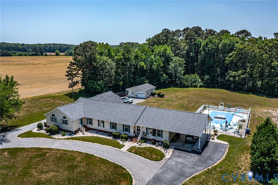4400 Hacks Neck Road Heathsville, VA 22473 - Photo 53 of 78 an aerial view of a house with swimming pool and big yard