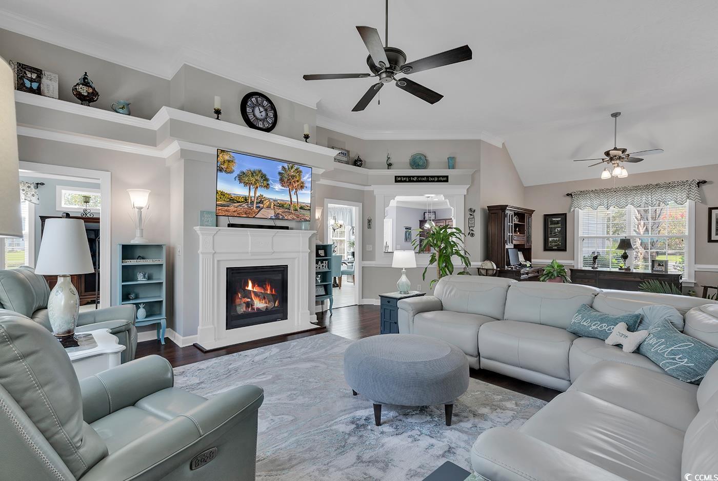 517 Stone Crest Court Murrells Inlet, SC 29576 - Photo 12 of 39 Living room with built in shelves, hardwood / wood