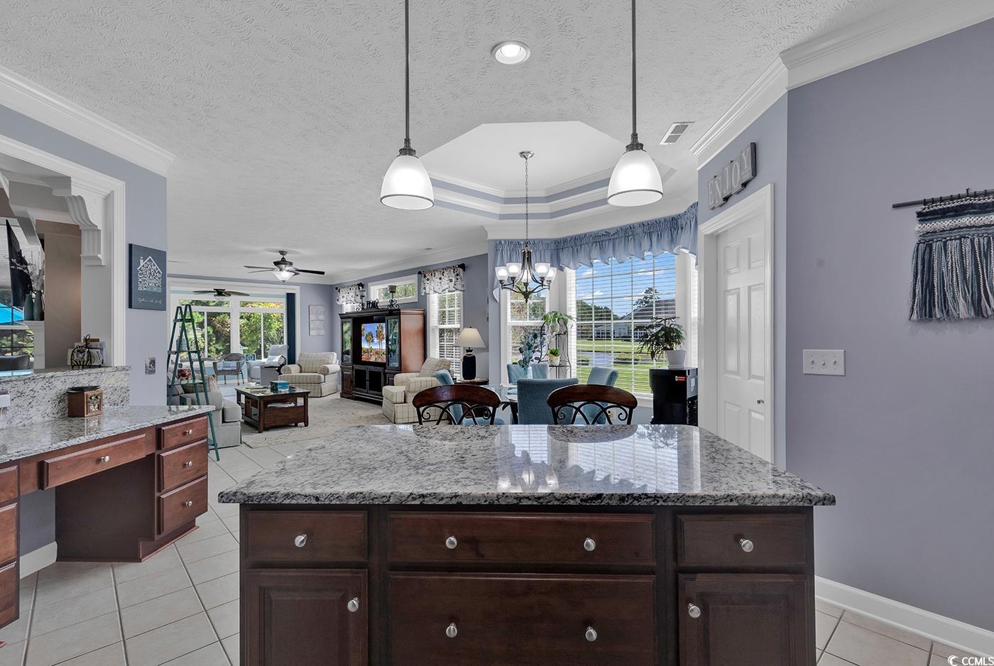 517 Stone Crest Court Murrells Inlet, SC 29576 - Photo 19 of 39 Kitchen with pendant lighting, ceiling fan, a kitc