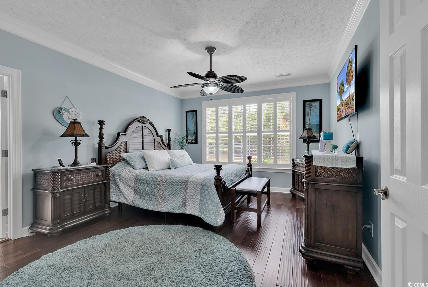 517 Stone Crest Court Murrells Inlet, SC 29576 - Photo 2 of 39 Bedroom featuring a textured ceiling, ceiling fan,