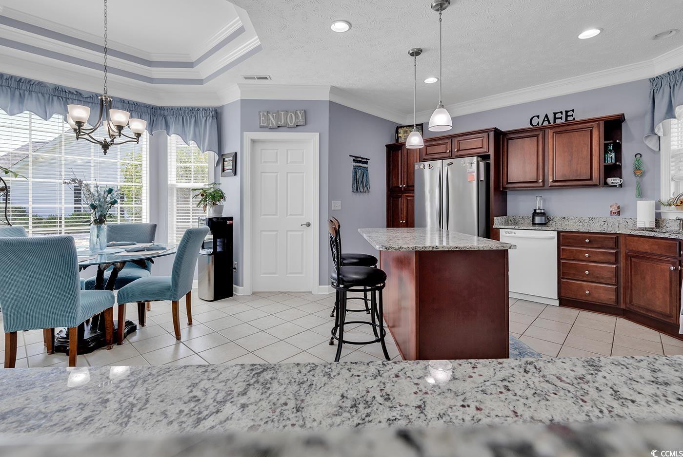 517 Stone Crest Court Murrells Inlet, SC 29576 - Photo 22 of 39 Kitchen with dishwasher, crown molding, decorative