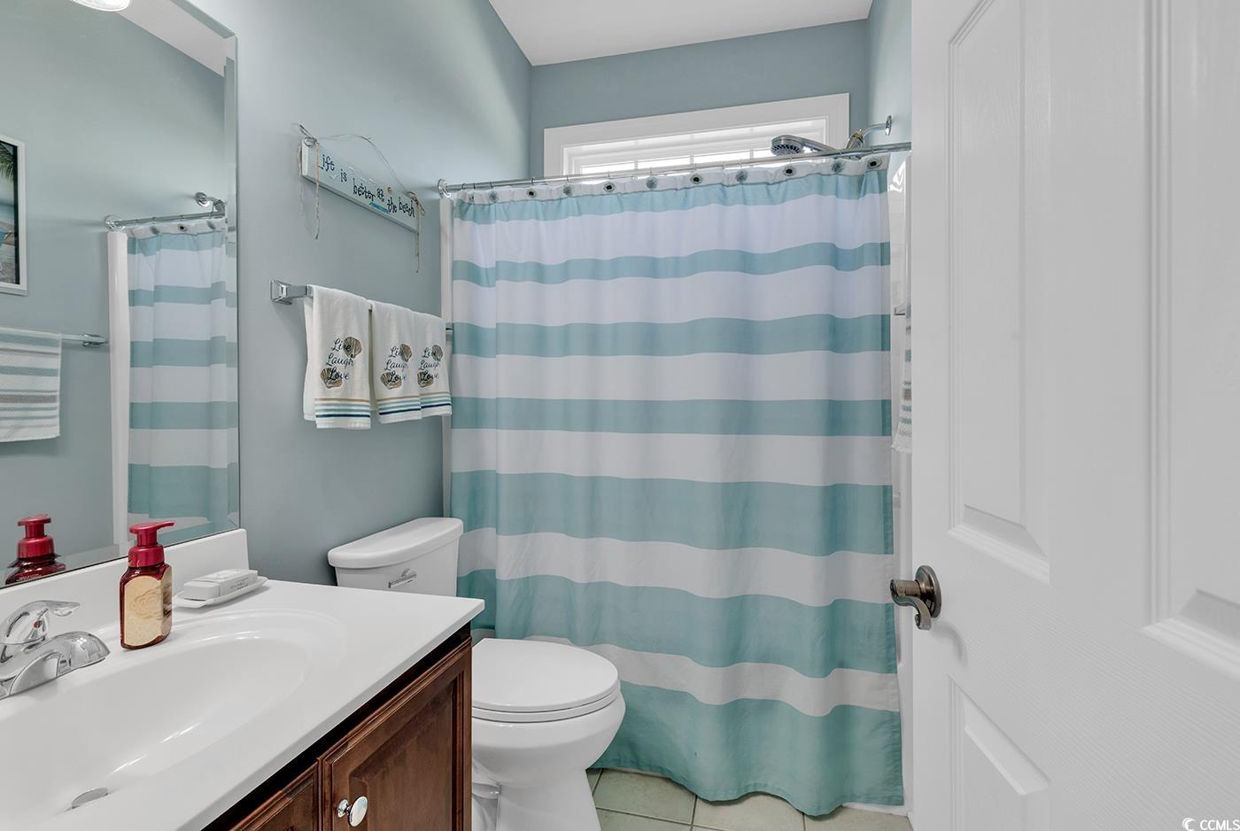 517 Stone Crest Court Murrells Inlet, SC 29576 - Photo 27 of 39 Bathroom featuring walk in shower, tile patterned