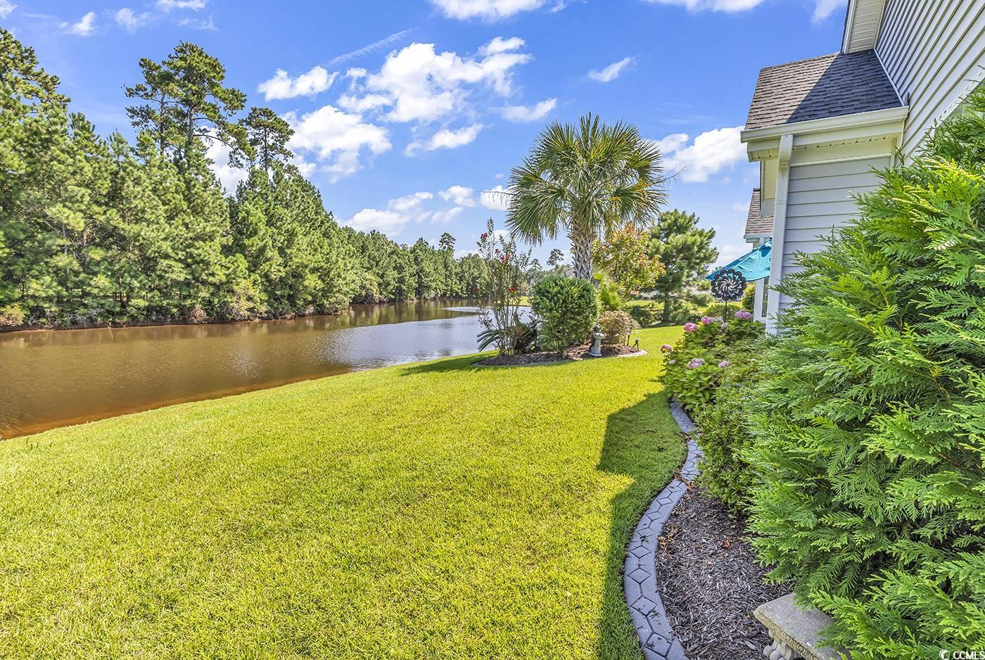 517 Stone Crest Court Murrells Inlet, SC 29576 - Photo 30 of 39 View of yard with a water view