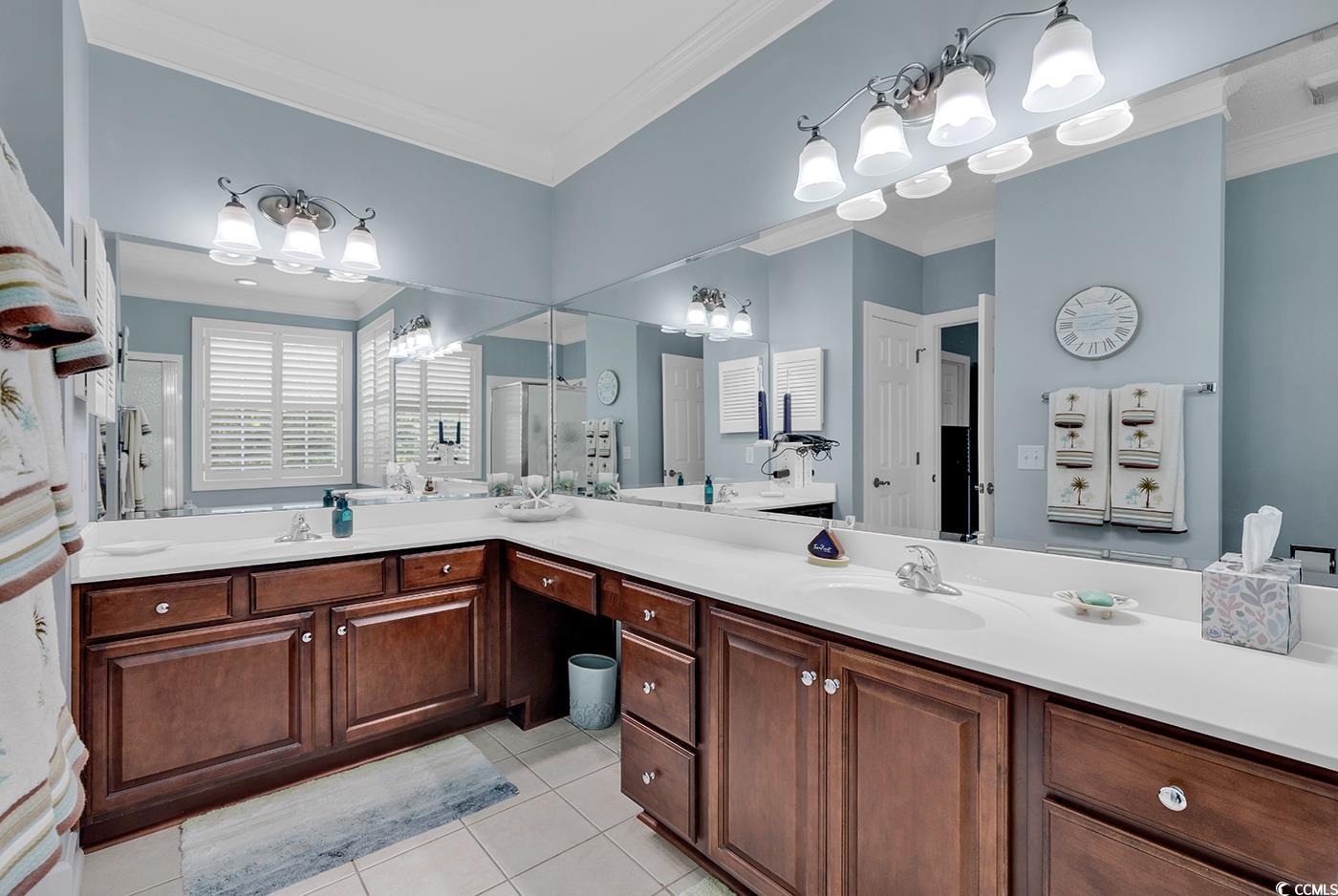 517 Stone Crest Court Murrells Inlet, SC 29576 - Photo 4 of 39 Bathroom featuring crown molding, tile patterned f