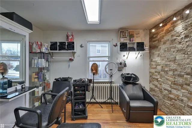 a room with furniture and wooden floor