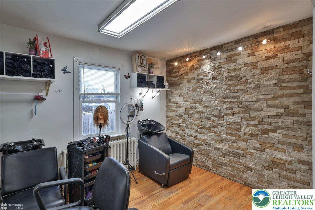 1147 Arcadia Street Bethlehem, PA 18018 - Photo 14 of 66 a room with furniture and wooden floor