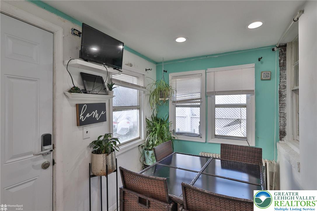 1147 Arcadia Street Bethlehem, PA 18018 - Photo 27 of 66 a living room with furniture and a flat screen tv