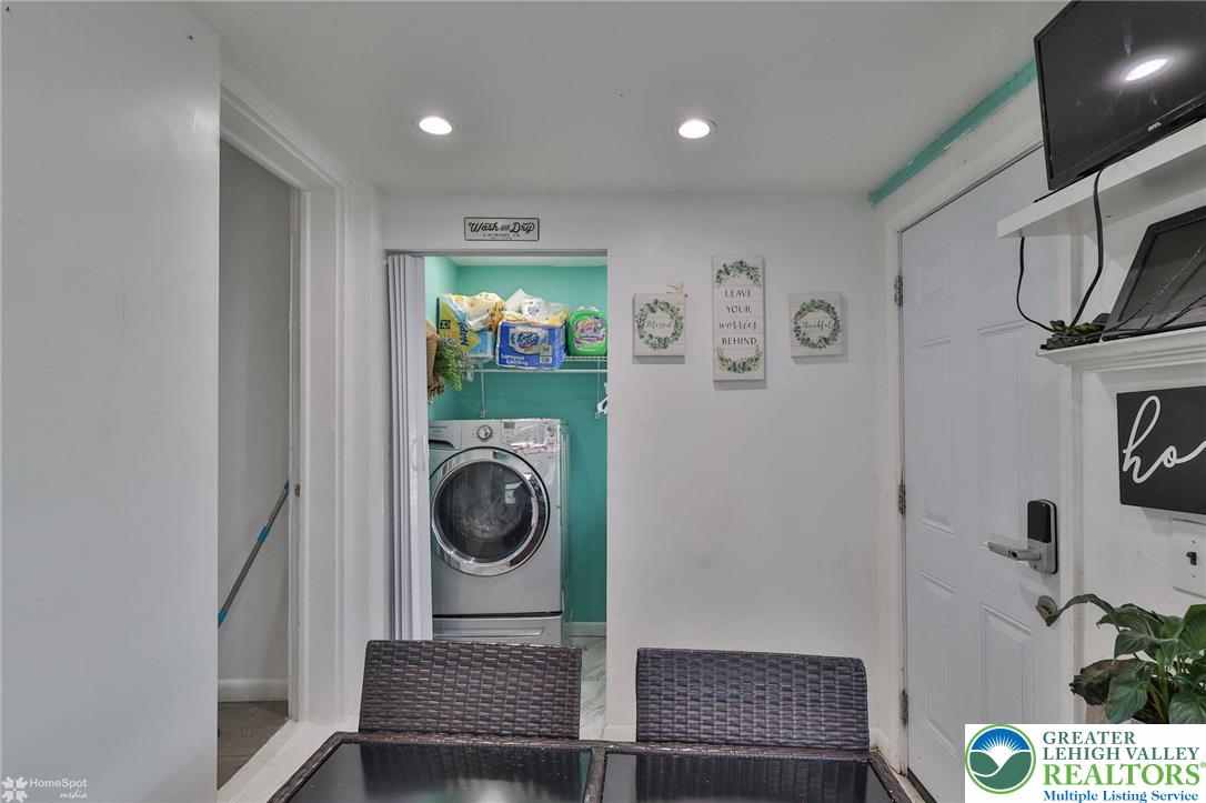 1147 Arcadia Street Bethlehem, PA 18018 - Photo 30 of 66 a view of a hallway with washer and dryer