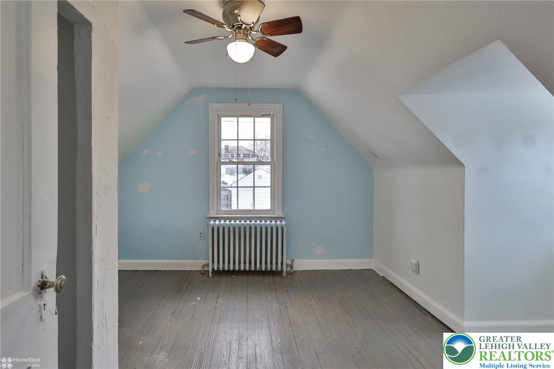 1147 Arcadia Street Bethlehem, PA 18018 - Photo 31 of 66 wooden floor in an empty room with a window