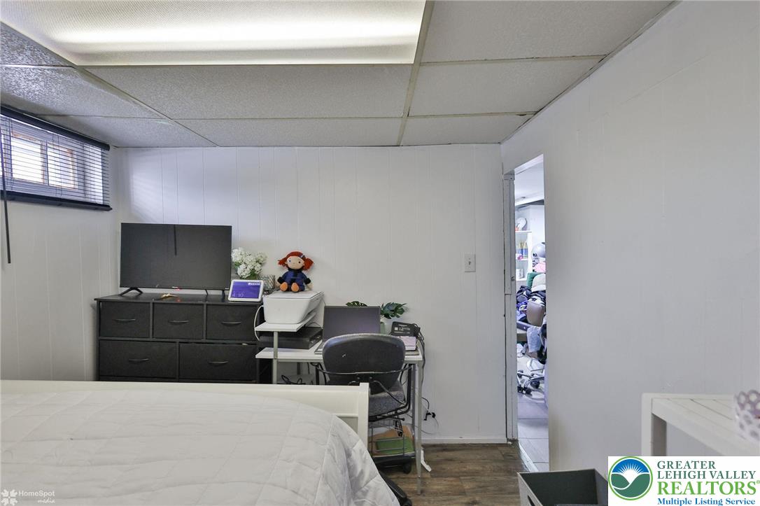 1147 Arcadia Street Bethlehem, PA 18018 - Photo 42 of 66 a bedroom with a bed and a television