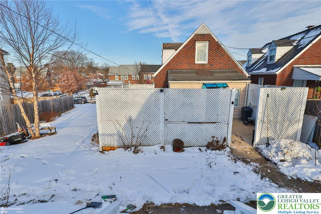 1147 Arcadia Street Bethlehem, PA 18018 - Photo 54 of 66 a view of a house with a snow in the yard