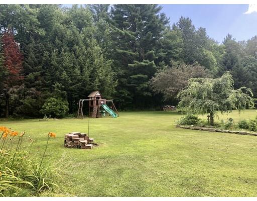 141 Center Road Gill, MA 01354 - Photo 12 of 37 a view of a backyard with swimming pool