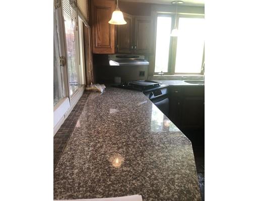 141 Center Road Gill, MA 01354 - Photo 17 of 37 a view of a kitchen with a sink and a window