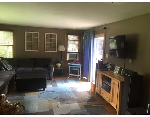 141 Center Road Gill, MA 01354 - Photo 20 of 37 a living room with furniture and a flat screen tv