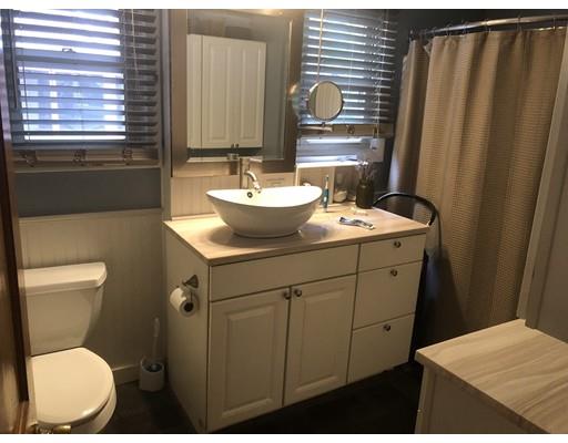 141 Center Road Gill, MA 01354 - Photo 22 of 37 a bathroom with a sink toilet and mirror