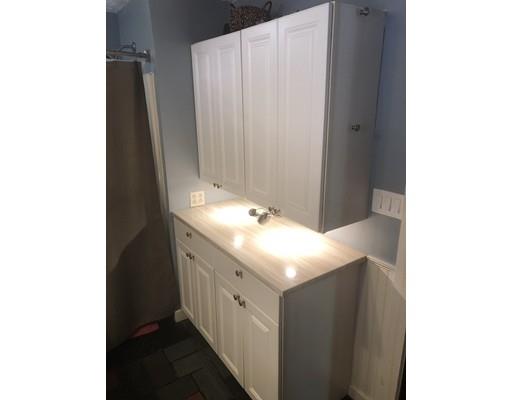 141 Center Road Gill, MA 01354 - Photo 23 of 37 a bathroom with a double vanity sink and a mirror