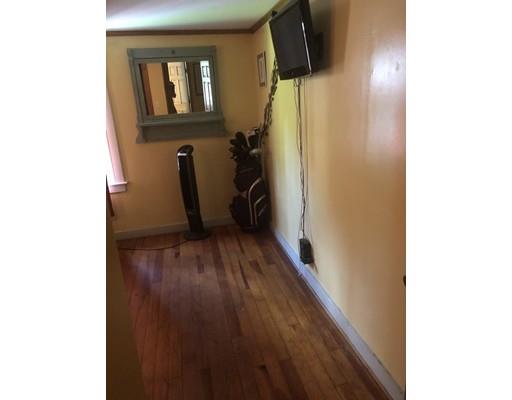 141 Center Road Gill, MA 01354 - Photo 27 of 37 a view of a hallway with wooden floor and stairs