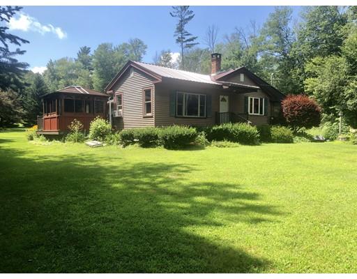141 Center Road Gill, MA 01354 - Photo 3 of 37 a front view of house with yard and green space