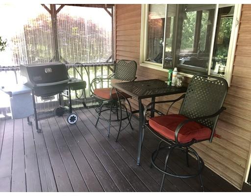141 Center Road Gill, MA 01354 - Photo 33 of 37 a outdoor dining space with furniture and wooden floor