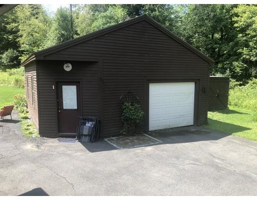 141 Center Road Gill, MA 01354 - Photo 36 of 37 a front view of a house with a yard