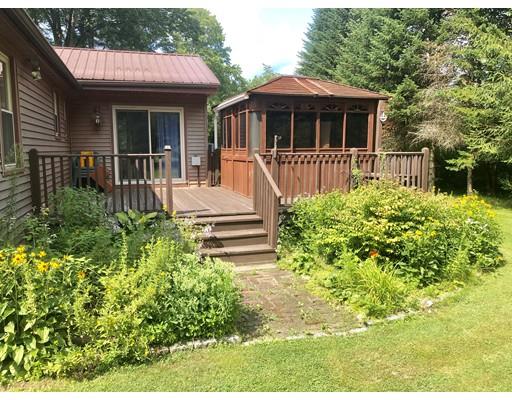 141 Center Road Gill, MA 01354 - Photo 5 of 37 a front view of a house with a yard