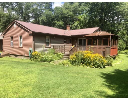 141 Center Road Gill, MA 01354 - Photo 6 of 37 a front view of a house with a yard