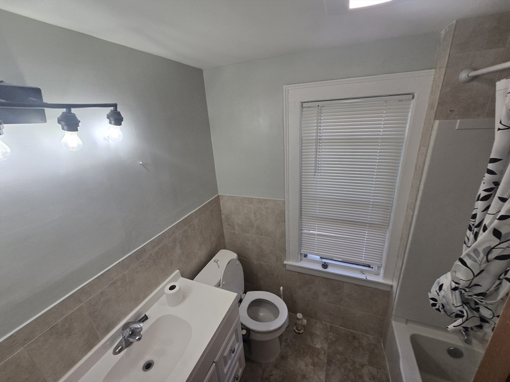 40 Catalpa Terrace Springfield, MA 01119 - Photo 15 of 24 a bathroom with a sink and toilet